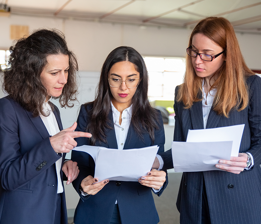 group-focused-young-women-studying-new-project 1